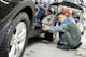 As a part of quality control in the automotive industry, an engineer is performing a final inspection.